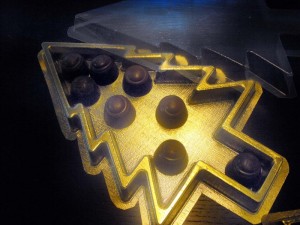 Gold plastic trays pralines